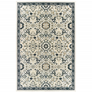 6' X 9' Ivory Navy And Gold Oriental Power Loom Stain Resistant Area Rug