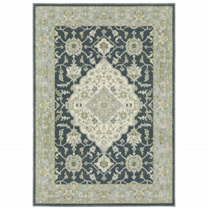 6' X 9' Teal Blue Ivory Green And Grey Oriental Power Loom Stain Resistant Area Rug