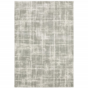 Grey And Ivory Abstract Shag Power Loom Stain Resistant Area Rug - 4' x 6'