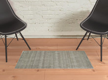 4' X 6' Black Wool Hand Woven Stain Resistant Area Rug
