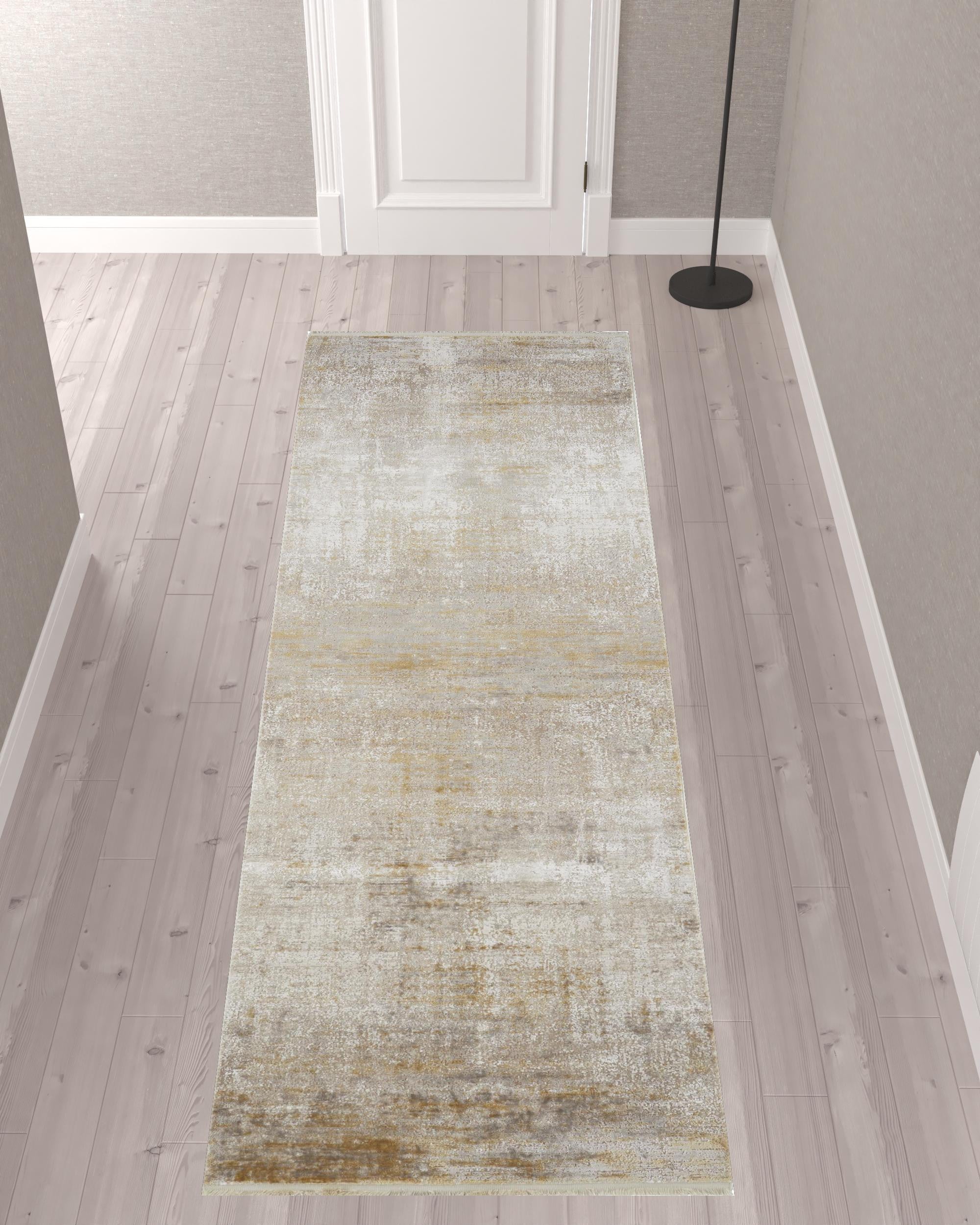 3' X 5' Taupe Ivory And Gold Abstract Power Loom Distressed Area Rug With Fringe