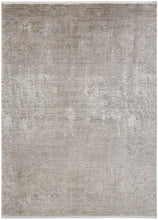 3' X 5' Taupe Ivory And Gold Abstract Power Loom Distressed Area Rug With Fringe