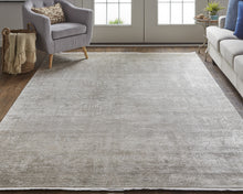 3' X 5' Taupe Ivory And Gold Abstract Power Loom Distressed Area Rug With Fringe