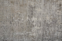 3' X 5' Taupe Ivory And Gold Abstract Power Loom Distressed Area Rug With Fringe