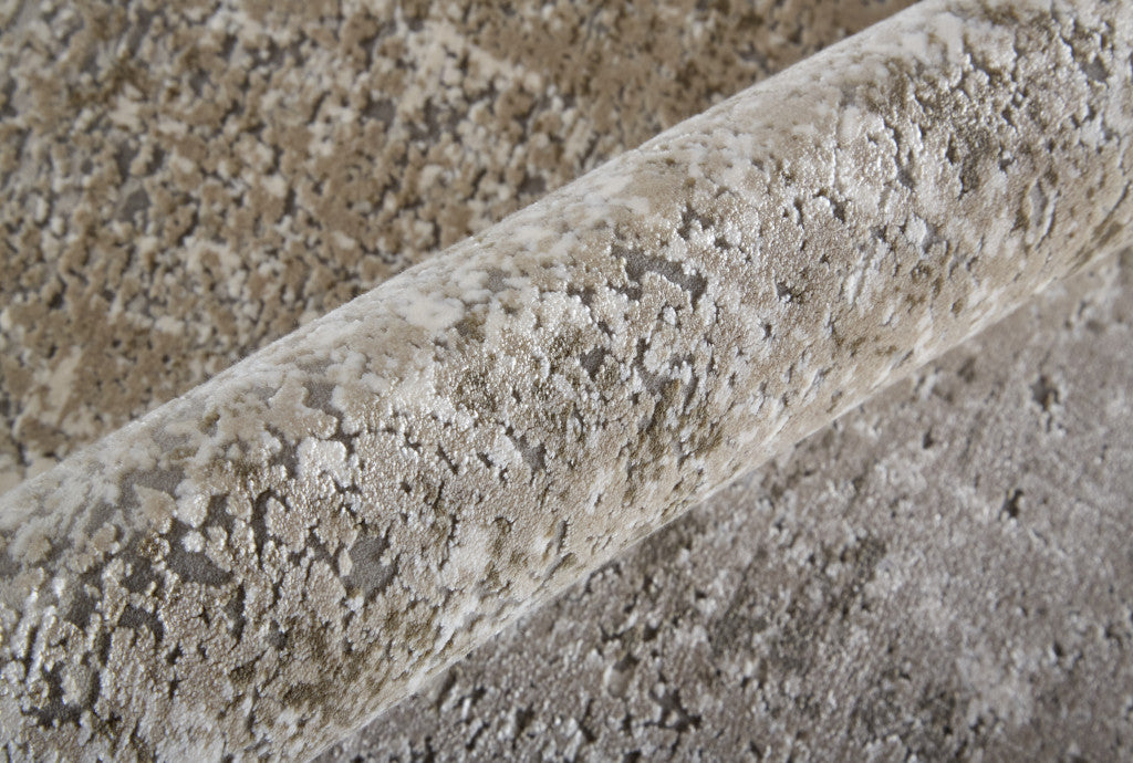 3' X 5' Taupe Ivory And Gold Abstract Power Loom Distressed Area Rug With Fringe