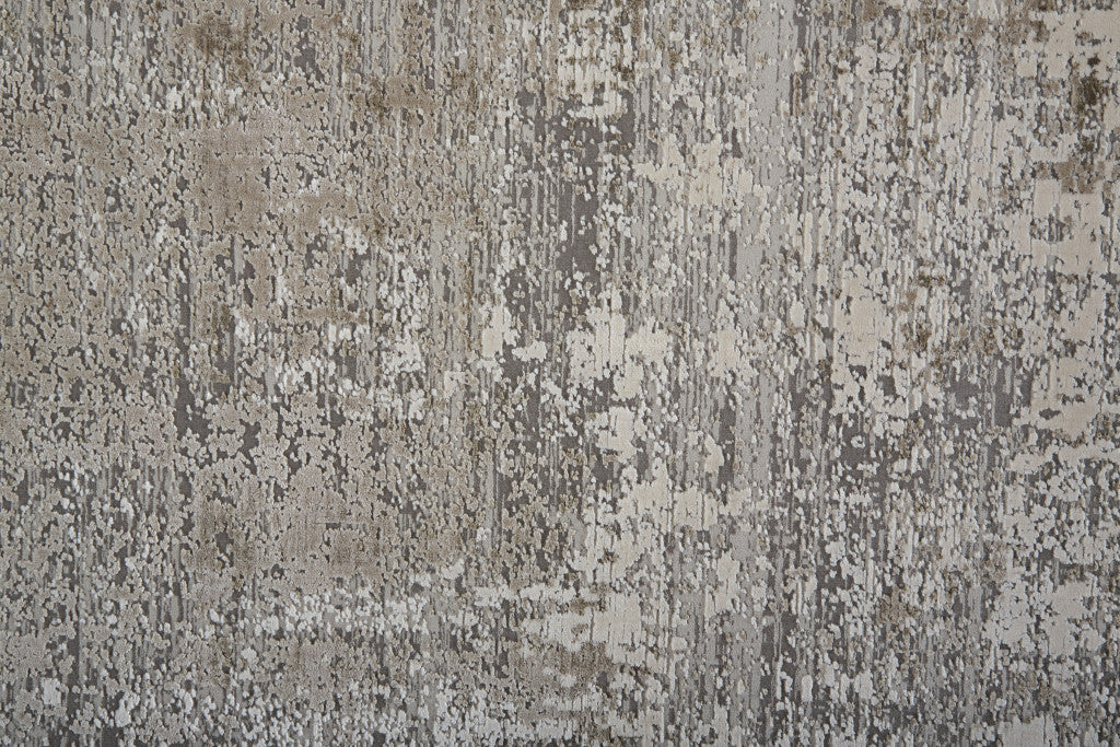 3' X 5' Taupe Ivory And Gold Abstract Power Loom Distressed Area Rug With Fringe