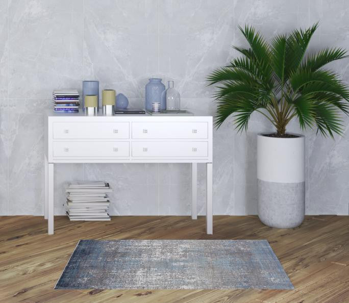 3' X 5' Taupe Ivory And Gold Abstract Power Loom Distressed Area Rug With Fringe