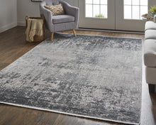 3' X 5' Taupe Ivory And Gold Abstract Power Loom Distressed Area Rug With Fringe