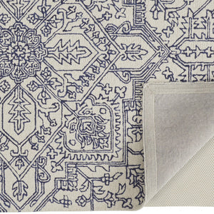 Ivory And Brown Wool Floral Tufted Handmade Stain Resistant Area Rug - 5' x 8'