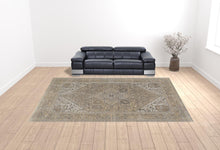 4' X 6' Brown Ivory And Tan Floral Power Loom Distressed Area Rug