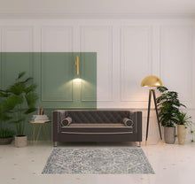 4' X 6' Blue Gray And Ivory Floral Power Loom Distressed Area Rug