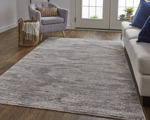 4' X 6' Tan Taupe And Gray Abstract Power Loom Distressed Stain Resistant Area Rug