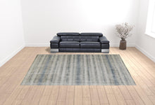 4' X 6' Tan Ivory And Pink Abstract Hand Woven Area Rug