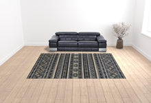 4' X 6' Blue Tan And Black Geometric Power Loom Distressed Stain Resistant Area Rug