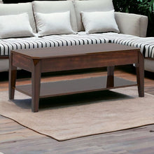 Mesa de centro de nogal con tapa elevable de 47