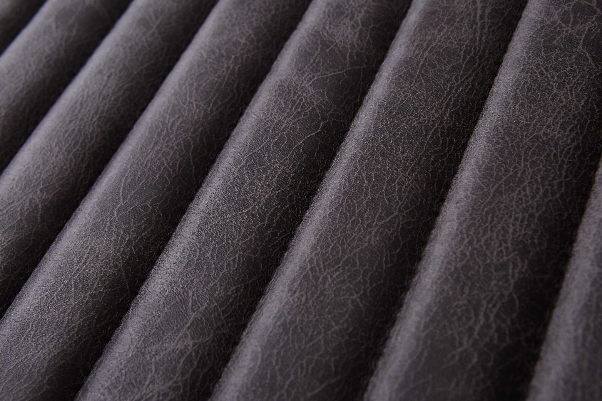 Sillón moderno ergonómico de piel sintética gris