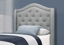 Tufted Grey Standard Bed Upholstered With Nailhead Trim And With Headboard