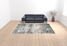 8' Ivory Teal Machine Woven Abstract Round Indoor Area Rug