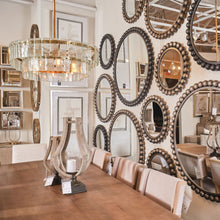 Espejo de pared redondo con marco de bola de metal negro de 43