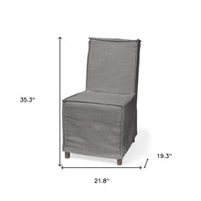 Grey Fabric Slip Cover With Brown Wooden Base Dining Chair