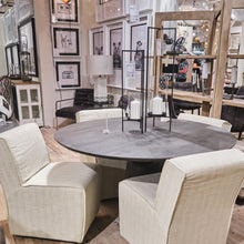 Fully Upholstered Cream Toned Fabric Dining Chair On Casters