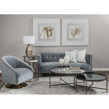 Mesa decorativa redonda con parte superior de espejo y base de metal negro y latón