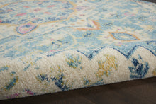 4’ X 6’ Light Blue And Ivory Distressed Area Rug