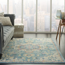 4’ X 6’ Light Blue And Ivory Distressed Area Rug