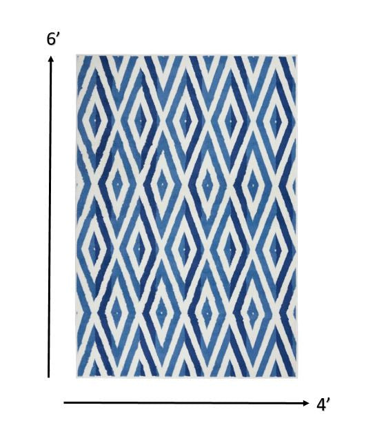 4’ X 6’ Ivory And Blue Diamond Area Rug