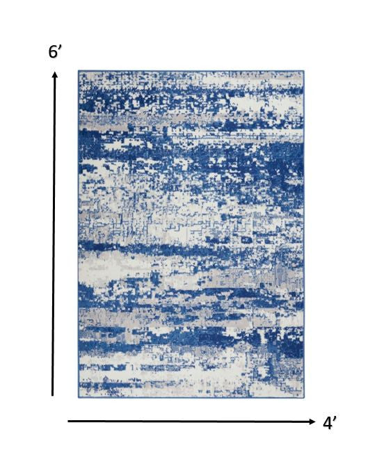 4’ X 6’ Ivory And Navy Oceanic Area Rug