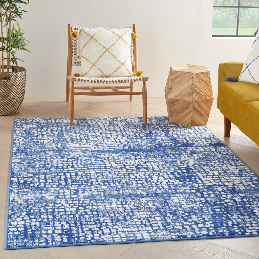 4’ X 6’ Ivory And Navy Abstract Grids Area Rug