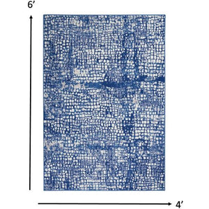 4’ X 6’ Ivory And Navy Abstract Grids Area Rug