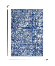 4’ X 6’ Ivory And Navy Abstract Grids Area Rug