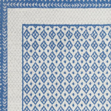 4’ X 6’ Ivory And Blue Geometric Area Rug