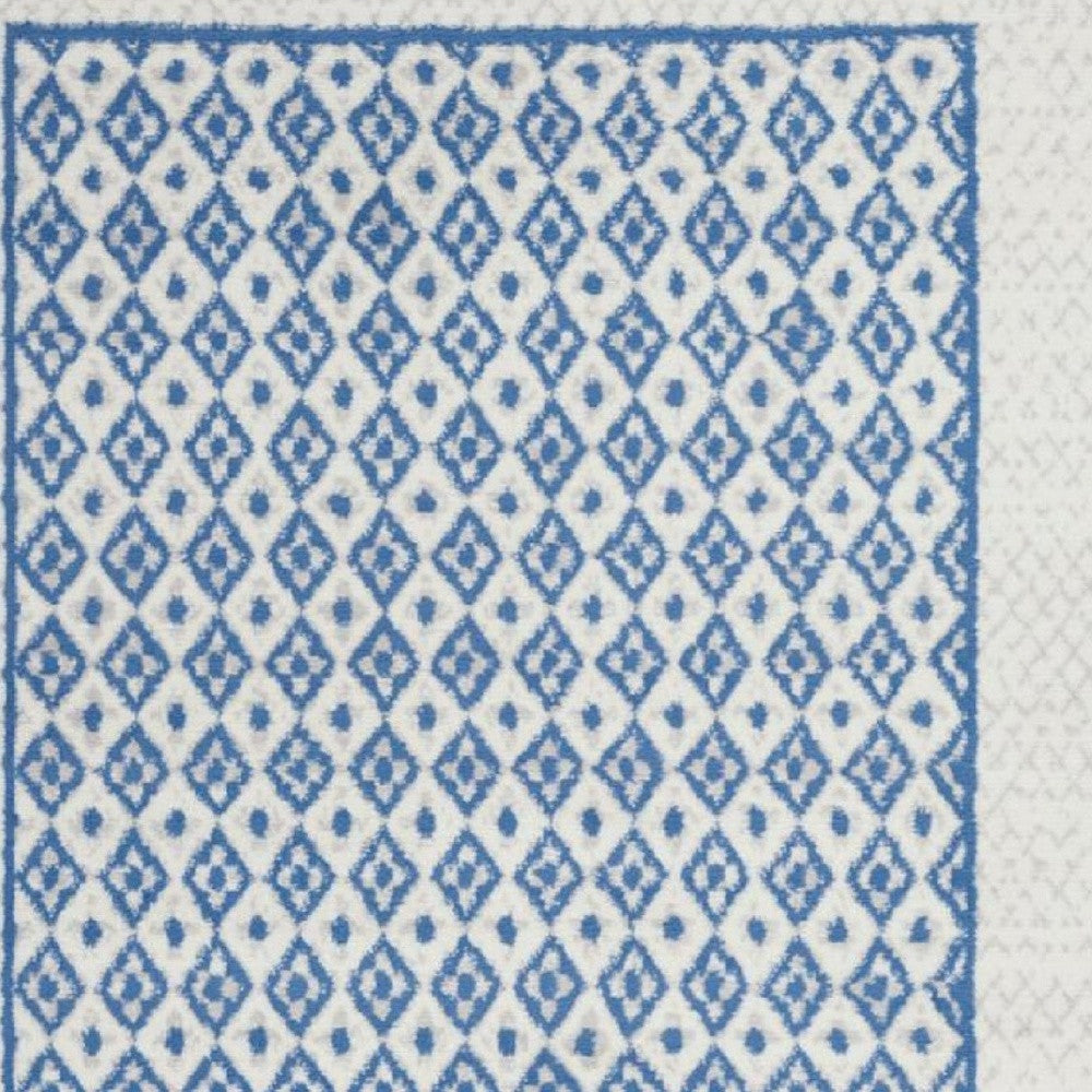 4’ X 6’ Ivory And Blue Geometric Area Rug