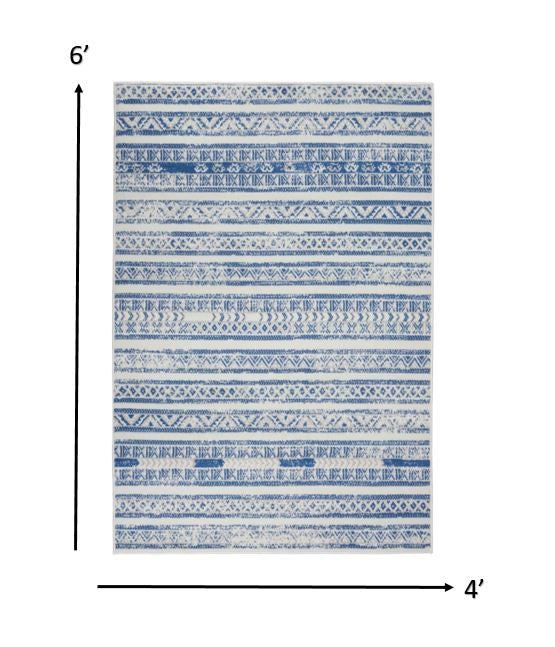 4’ X 6’ Ivory And Blue Distressed Area Rug