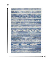 4’ X 6’ Ivory And Blue Distressed Area Rug