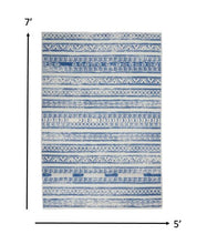 4’ X 6’ Ivory And Blue Distressed Area Rug