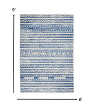 4’ X 6’ Ivory And Blue Distressed Area Rug