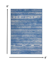 4’ X 6’ Ivory And Blue Distressed Area Rug