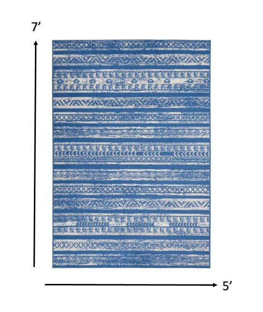 4’ X 6’ Ivory And Blue Distressed Area Rug