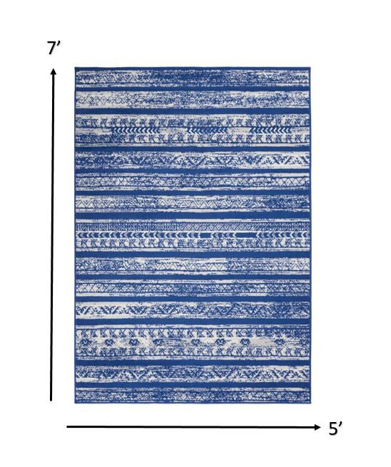 4’ X 6’ Ivory And Blue Distressed Area Rug