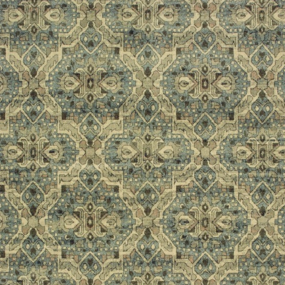 5’X8’ Ivory And Blue Geometric Area Rug