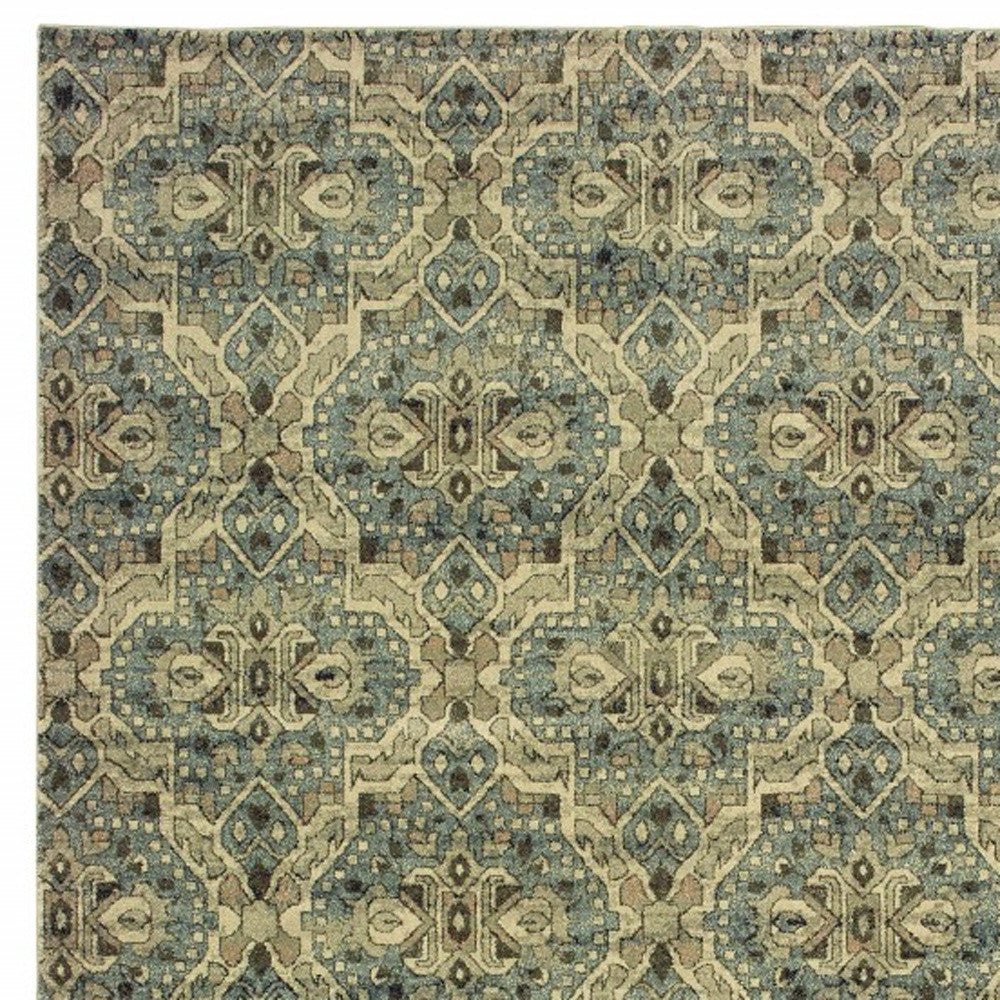 5’X8’ Ivory And Blue Geometric Area Rug