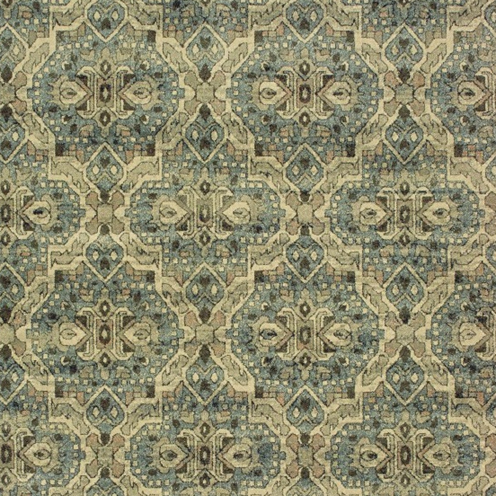 5’X8’ Ivory And Blue Geometric Area Rug