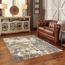 Gray And Ivory Abstract Area Rug - 4’ x 6’