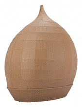 Sofá cama beige y natural con forma de lágrima