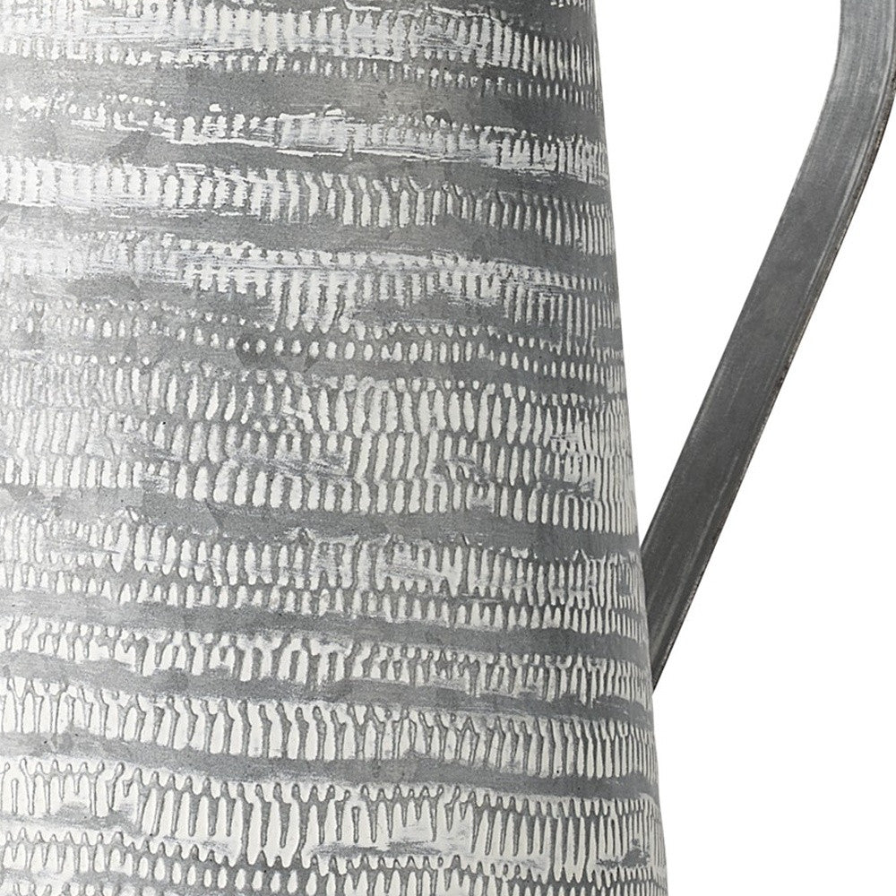 Gray And White Patterned Metal Jug