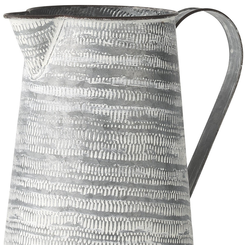 Gray And White Patterned Metal Jug