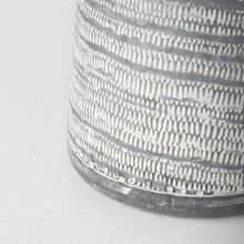 Gray And White Patterned Metal Jug